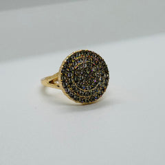 ornate gold-toned ring